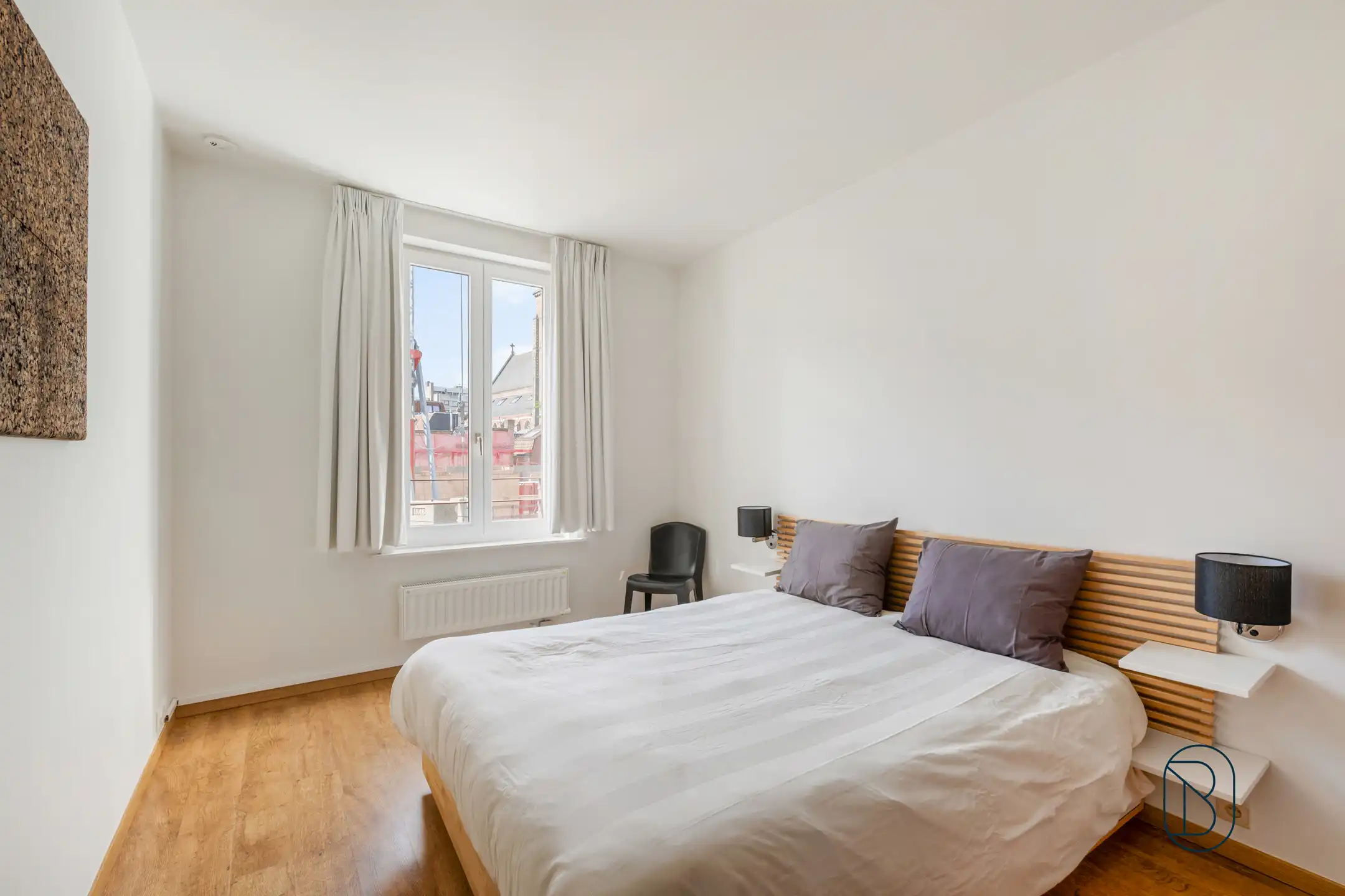 Handelspand + 2 gerenoveerde appartementen hartje Kortrijk foto 9