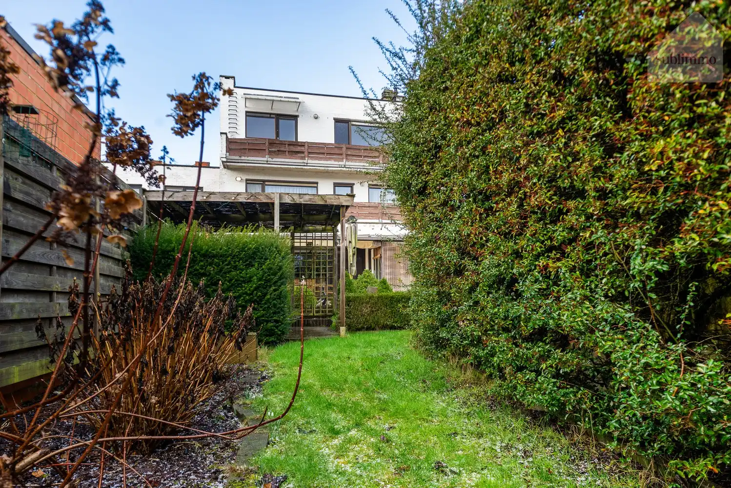 Opbrengsteigendom met 2 appartementen, tuin en garages te koop in Mol centrum foto 37
