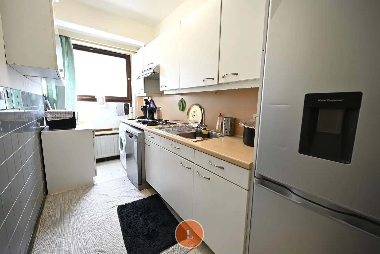 Opbrengst appartement met 2 slaapkamers en garage te koop in Roeselare! foto 5