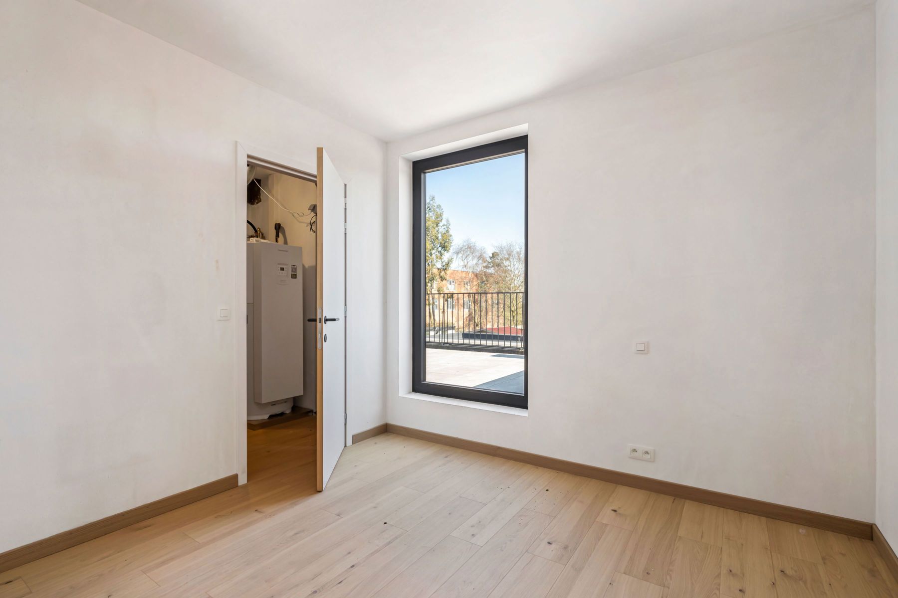 Nieuwbouwappartement met zéér ruim terras en groen zicht foto 17