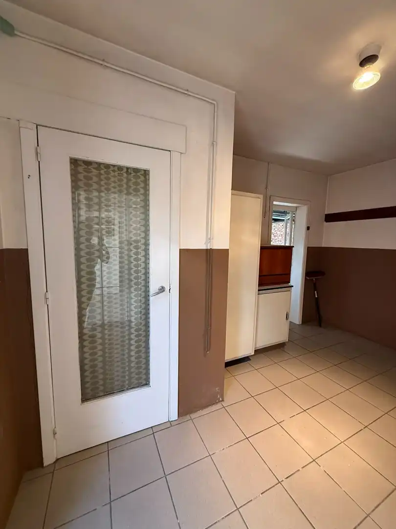 Ruime woning met 2 slaapkamers, veranda en volledig omheinde tuin te Heppen foto 17