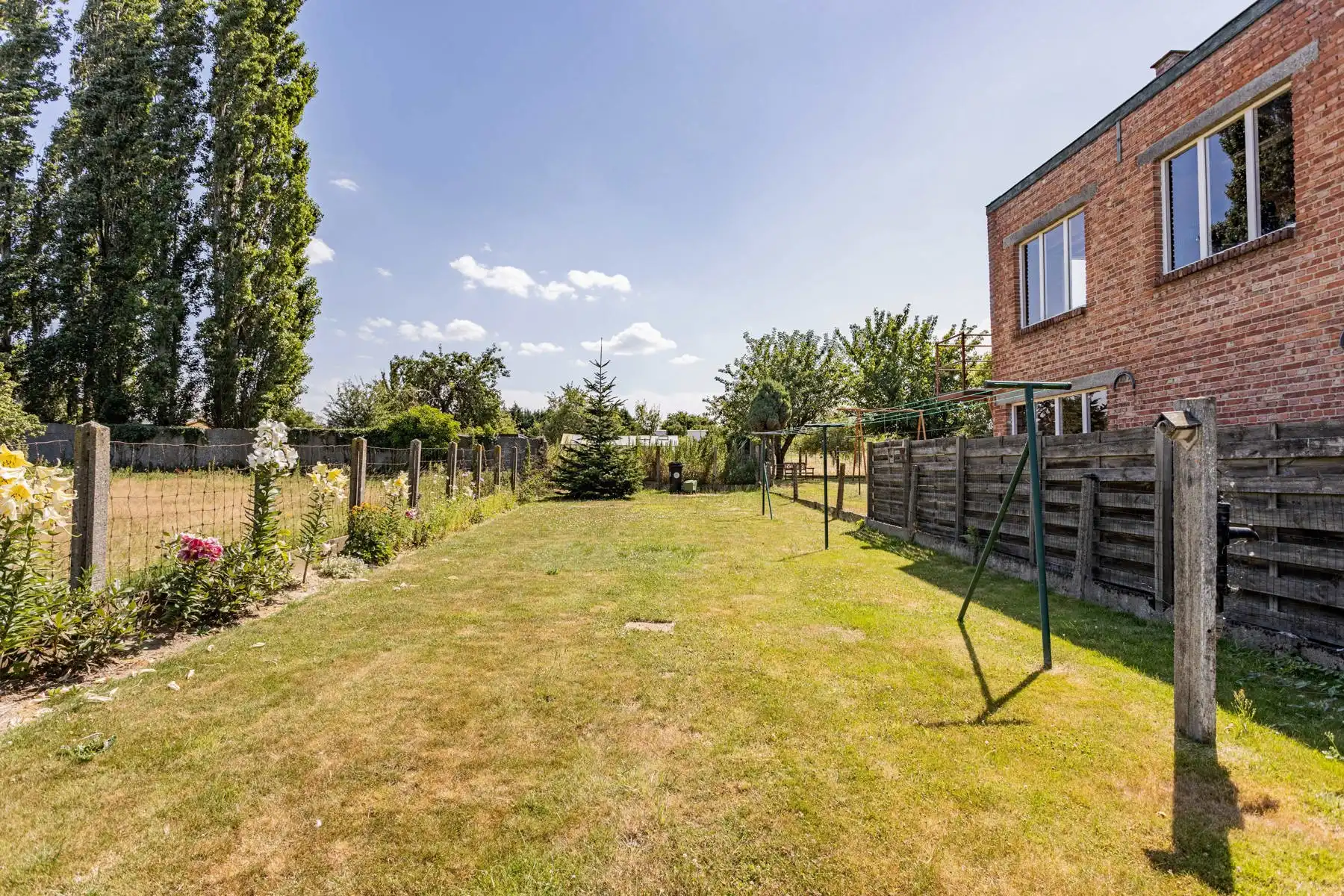 Leuke half-open bebouwingn met zuidgerichte tuin! foto 32
