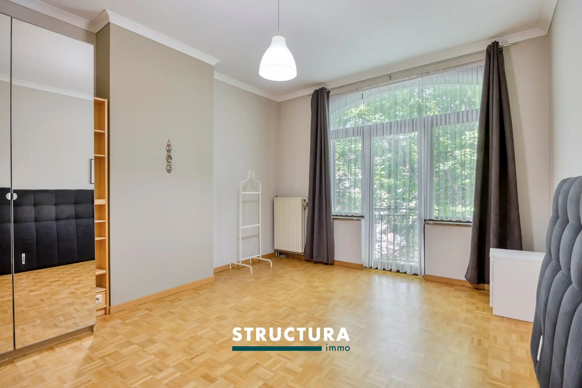 Ruime en lichtrijke woning met een aangename zuidgerichte tuin. foto 28