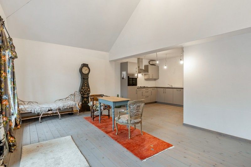 Woonappartement met handelsruimte in het centrum van Wommersom foto 12
