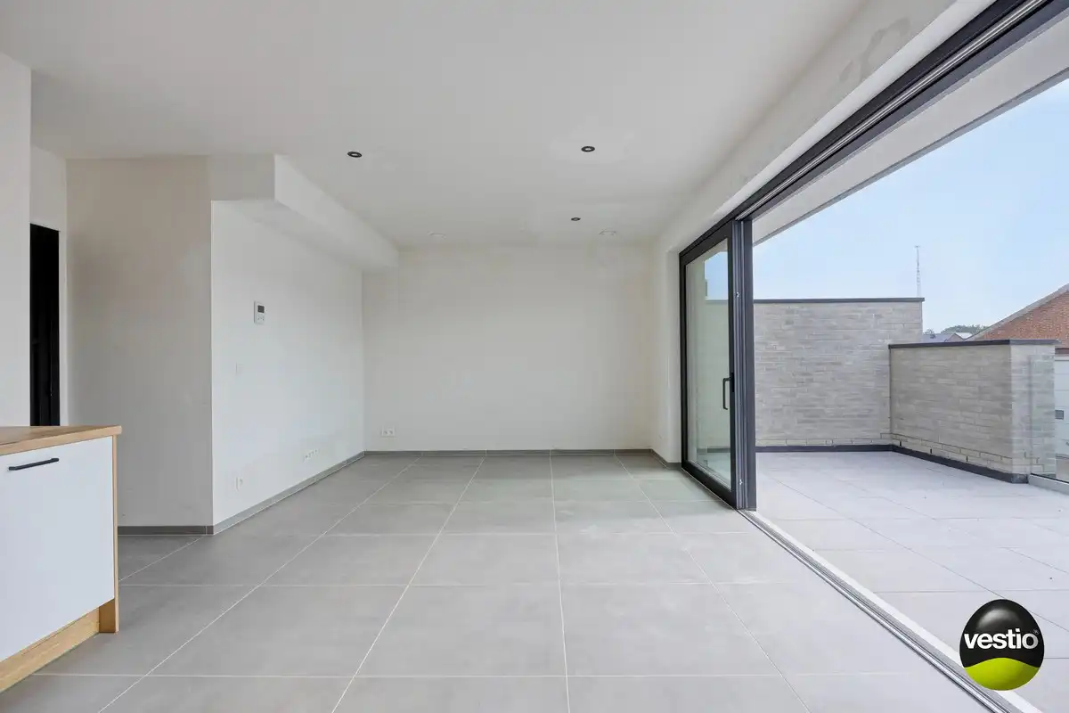 Nieuwbouwappartement met 2 slaapkamers en ruim terras in Munsterbilzen – slechts 2% registratierechten! foto 9