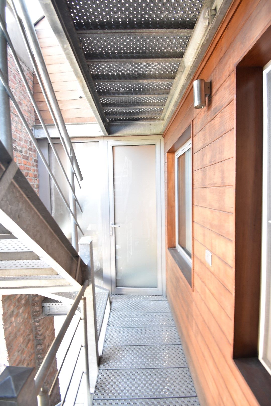 Duplex-appartement met 1 slaapkamer met unieke architectuur in hartje Beverst foto 24