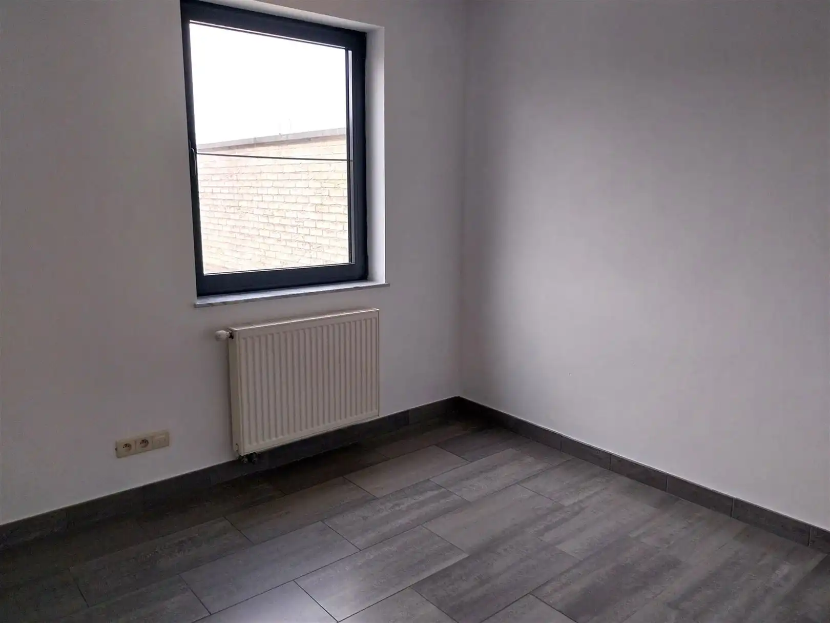 TE HUUR: Gelijkvloers appartement met 3 slaapkamers in Heusden-Zolder! foto 14