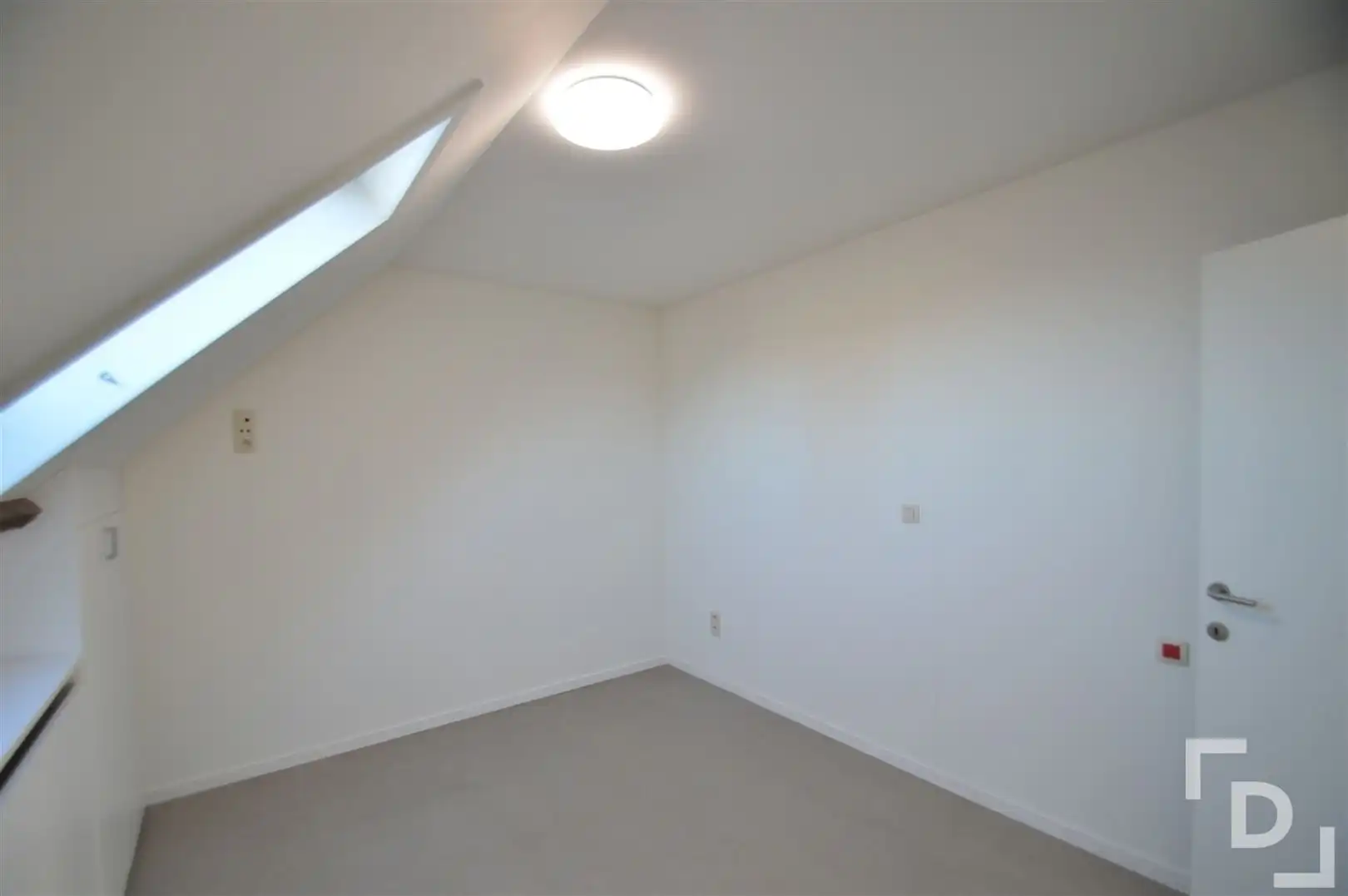 Dakappartement met zicht op het dorpsplein foto 6