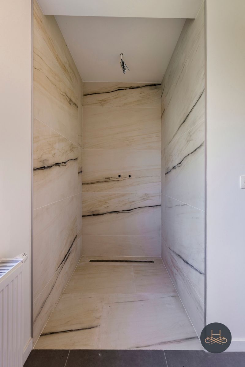 Vernieuwbouwvilla met praktijkruimte in rustige buurt foto 14