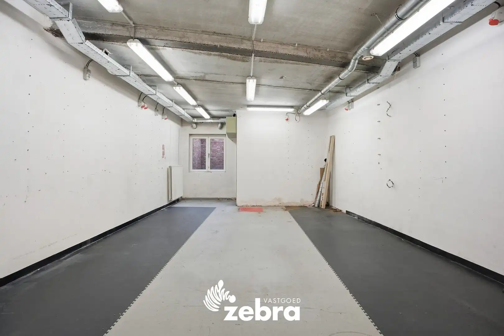 Commercieel handelspand met stijlvolle woonst in centrum Roeselare! foto 7