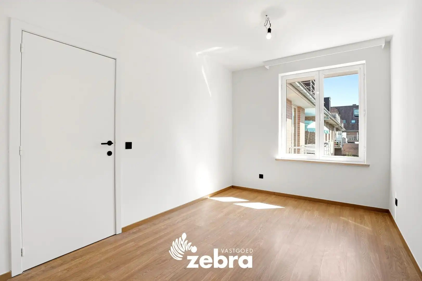 Zeer ruim appartement (137 m²) te koop met dubbele garage in het hartje van Tielt! foto 24