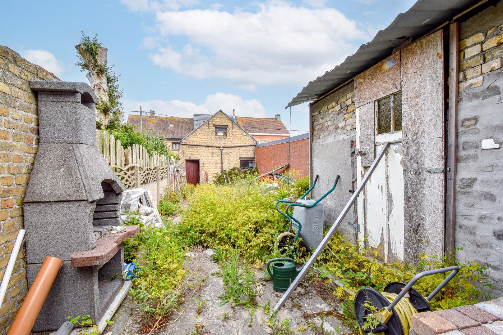 Ruime gezinswoning met 4 slaapkamers, tuin en garage – ideaal renovatieproject te Lombardsijde foto 13