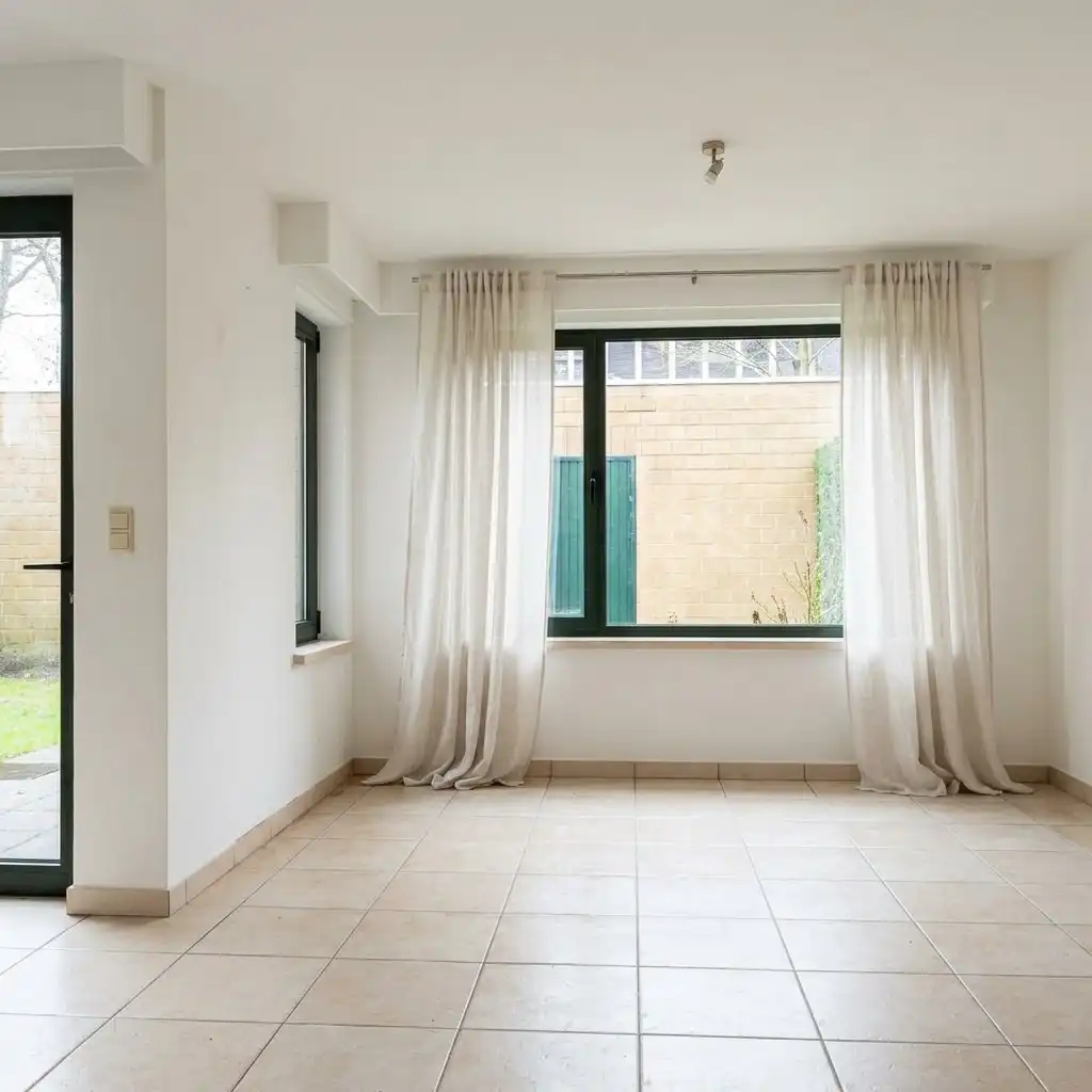 Gezellig gelijkvloersappartement met zonnige tuin en garage foto 4