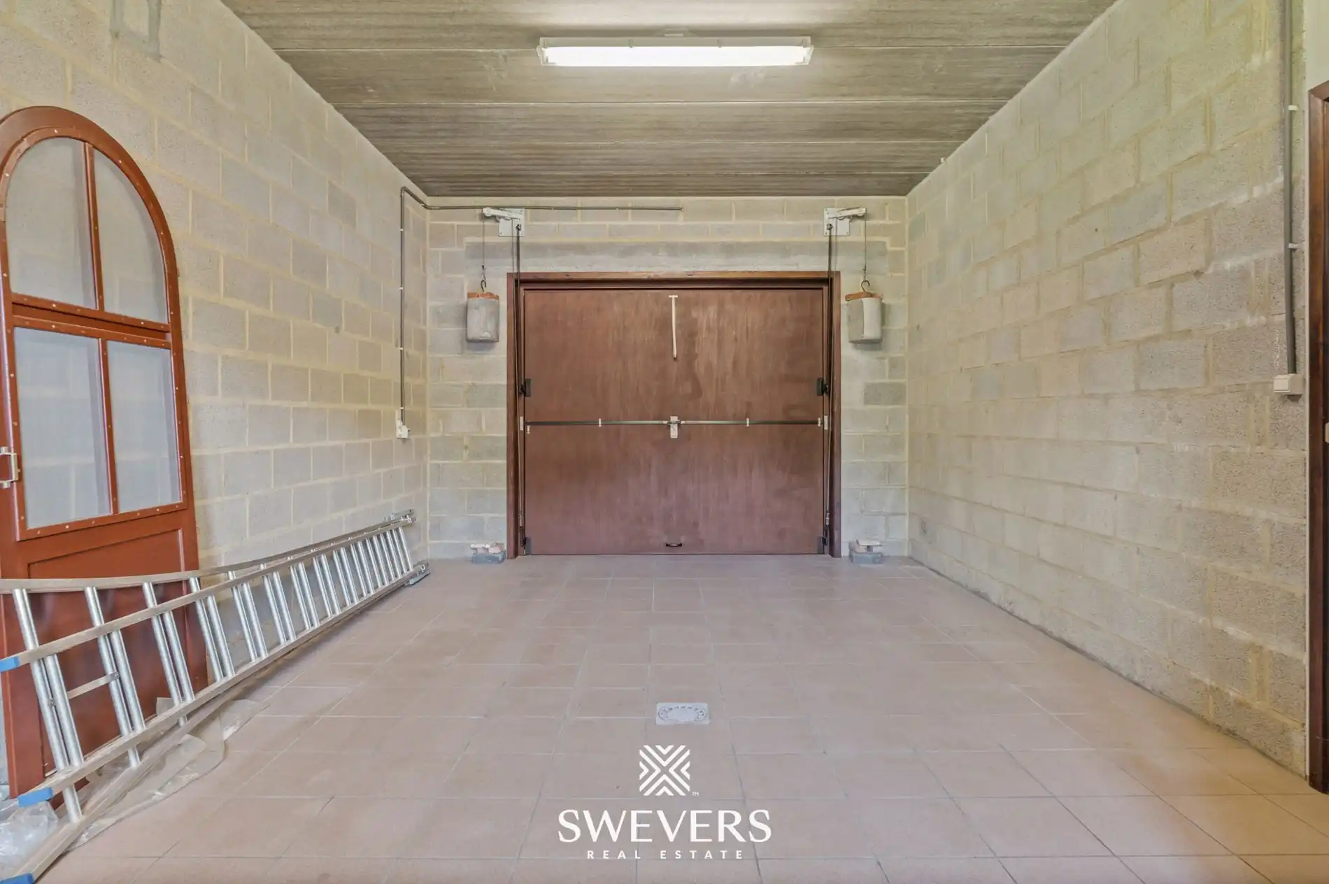 Open bebouwing op 4.010 m² rustig gelegen met flexibele indeling en sterke bouw in Paal foto 29