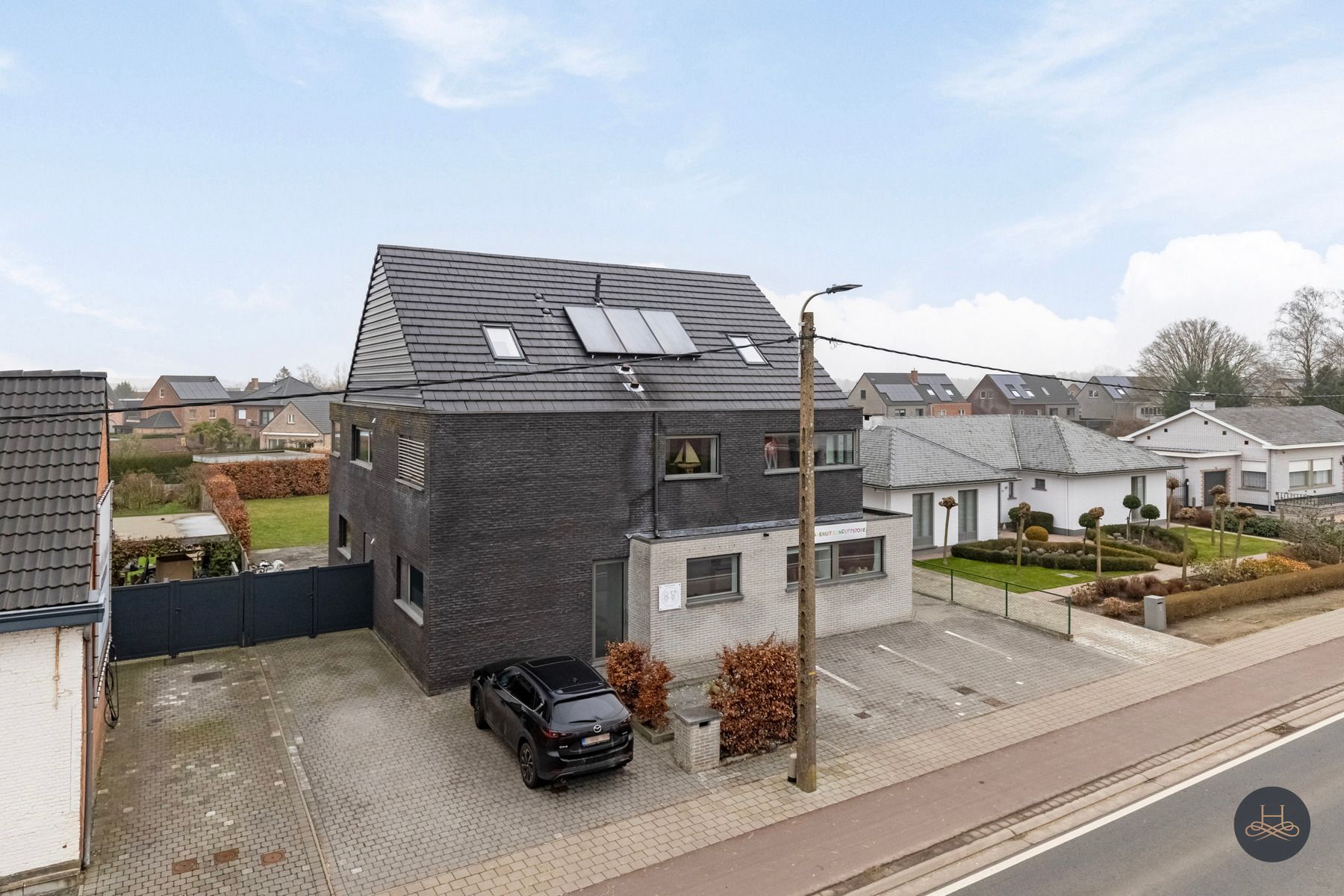 Luxueuze ruime BEN-woning met handelspand en appartement foto 4