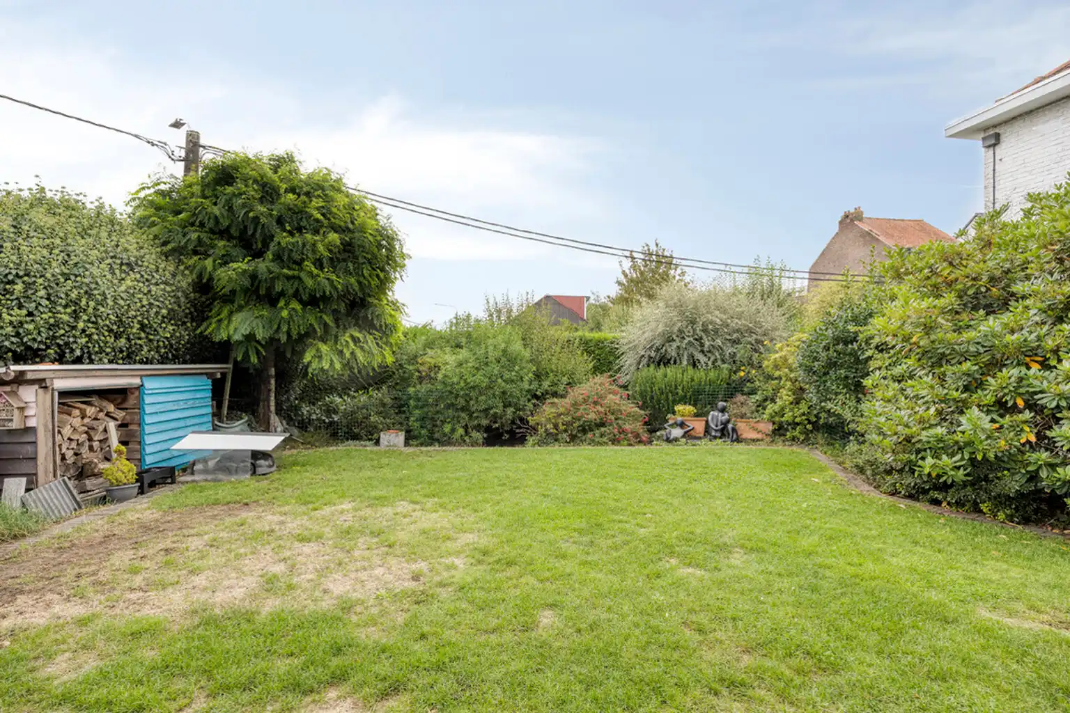 Instapklare woning met 4 slaapkamers, tuin & 2 garages foto 30