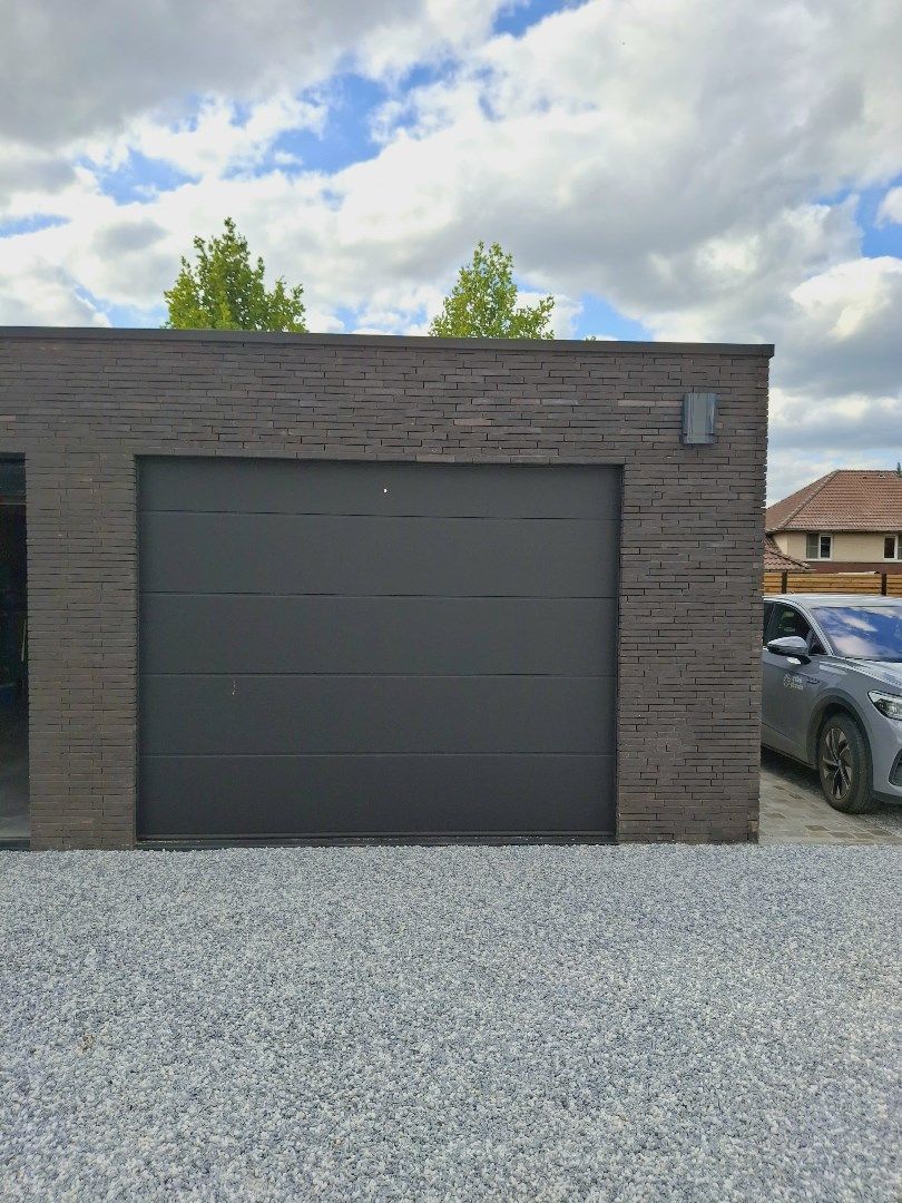 RUIM, VOLLEDIG GERENOVEERD APPARTEMENT MET TWEE SLAAPKAMERS EN GARAGE IN HARTJE AARSELE foto 10