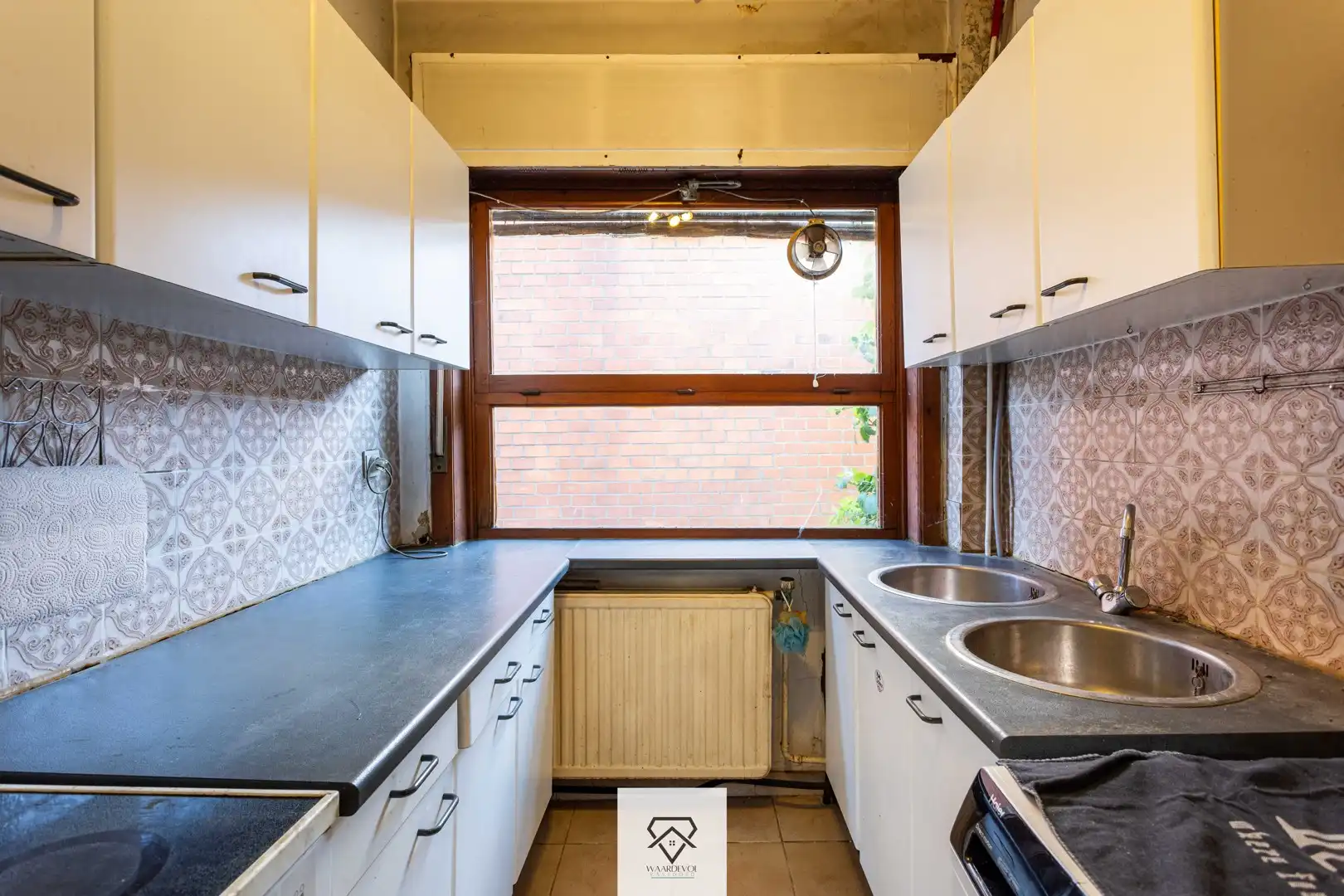 Gezinswoning met tuin en veel potentieel in het gegeerde Oostakker foto 16