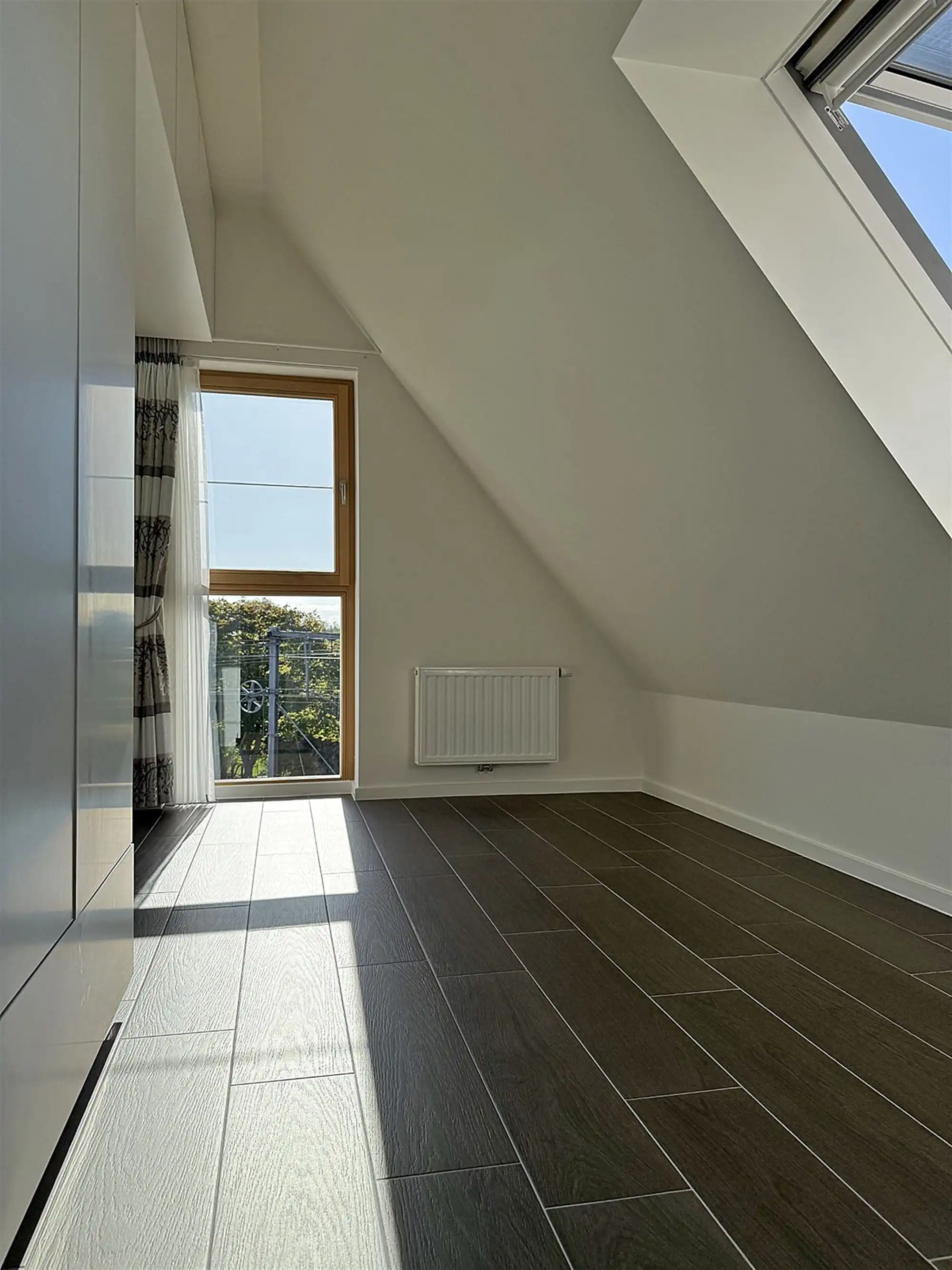 Recent, instapklaar APPARTEMENT met 2 slaapkamers, terras & overdekte autostaanplaats foto 14