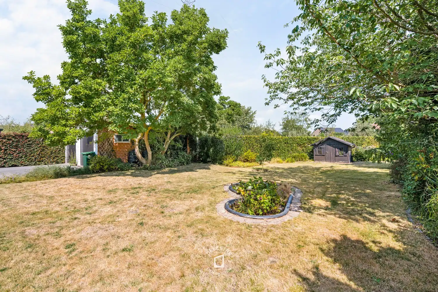 RUIME WONING met garage voor 2 wagens en grote tuin op centrale ligging in Welle foto 23