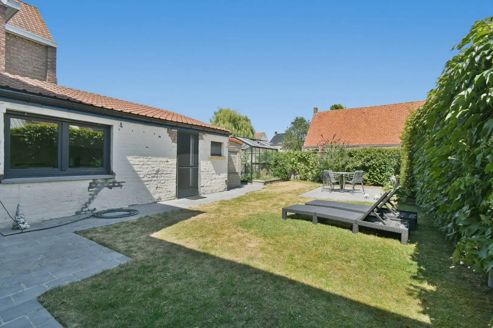 Gezellige stadswoning met 2 slaapkamers en 2 badkamers en tuin foto 16
