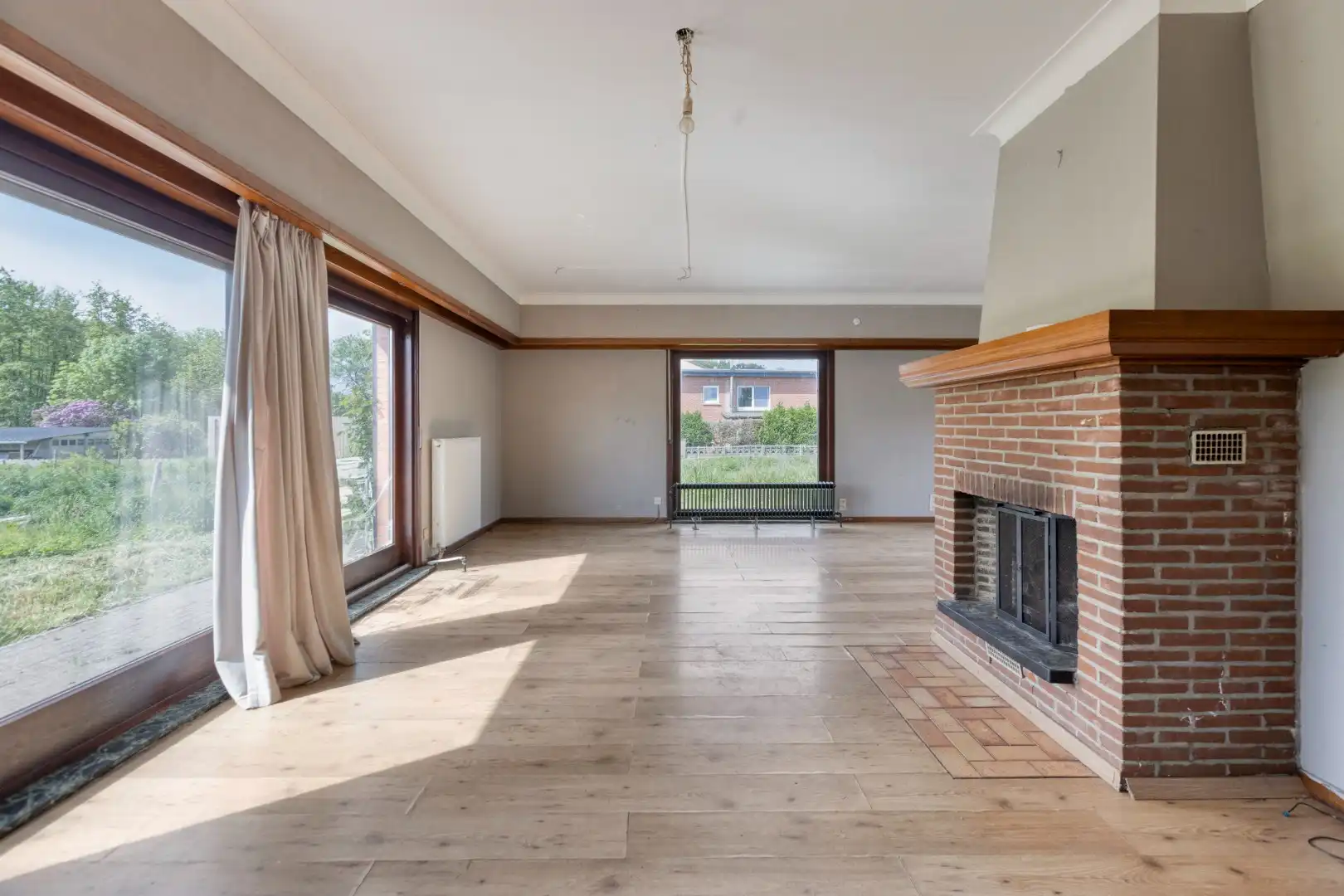 Te renoveren woning met 3 slpks op een zonnig perceel van 1.195 m² !  foto 3