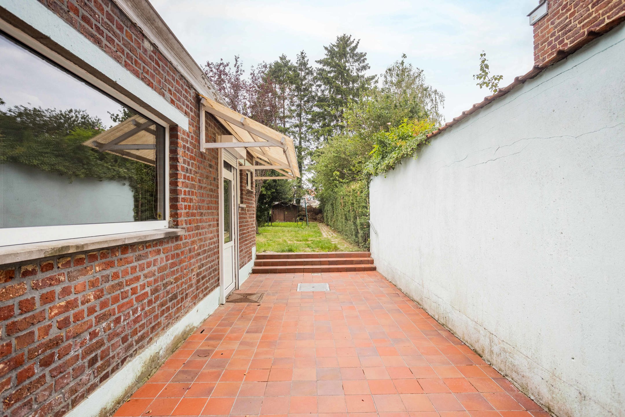 Ruime instapklare woning met tuin en 3 slaapkamers foto 22