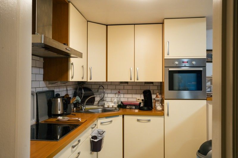 Praktische en instapklare 2-slaapkamerappartement met terras in hartje Beringen-Mijn foto 14