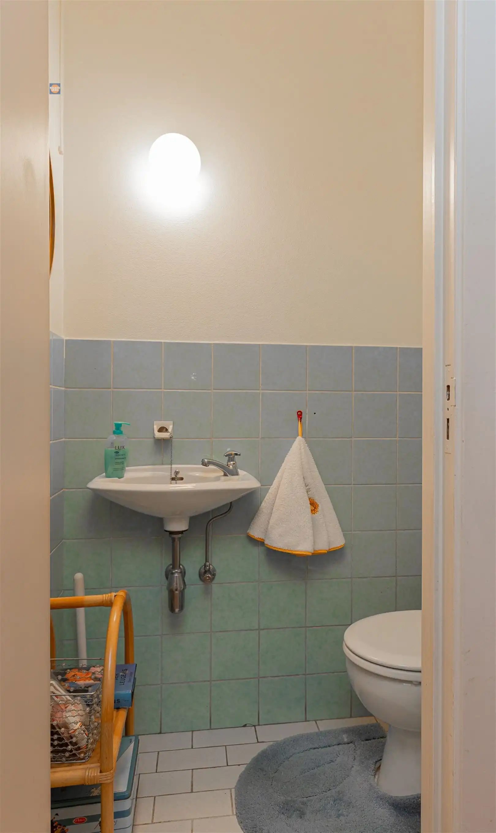 Gelijkvloers 2-slaapkamerappartement met tuin en garage foto 10