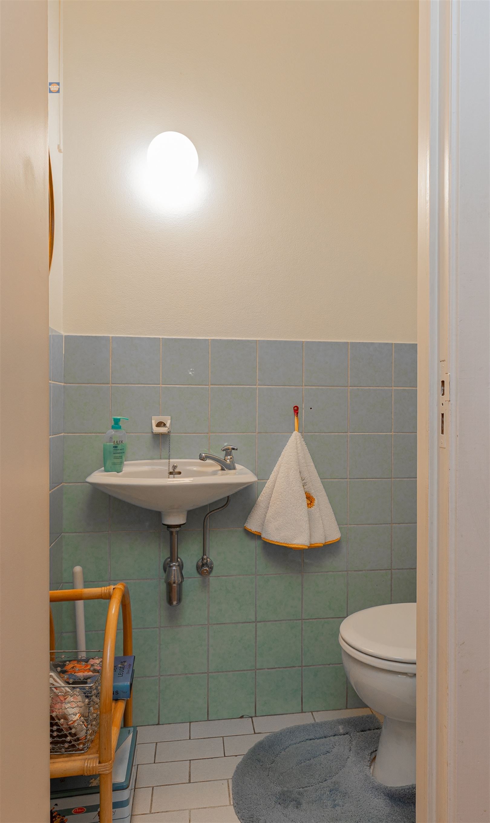 Gelijkvloers 2-slaapkamerappartement met tuin en garage foto 10