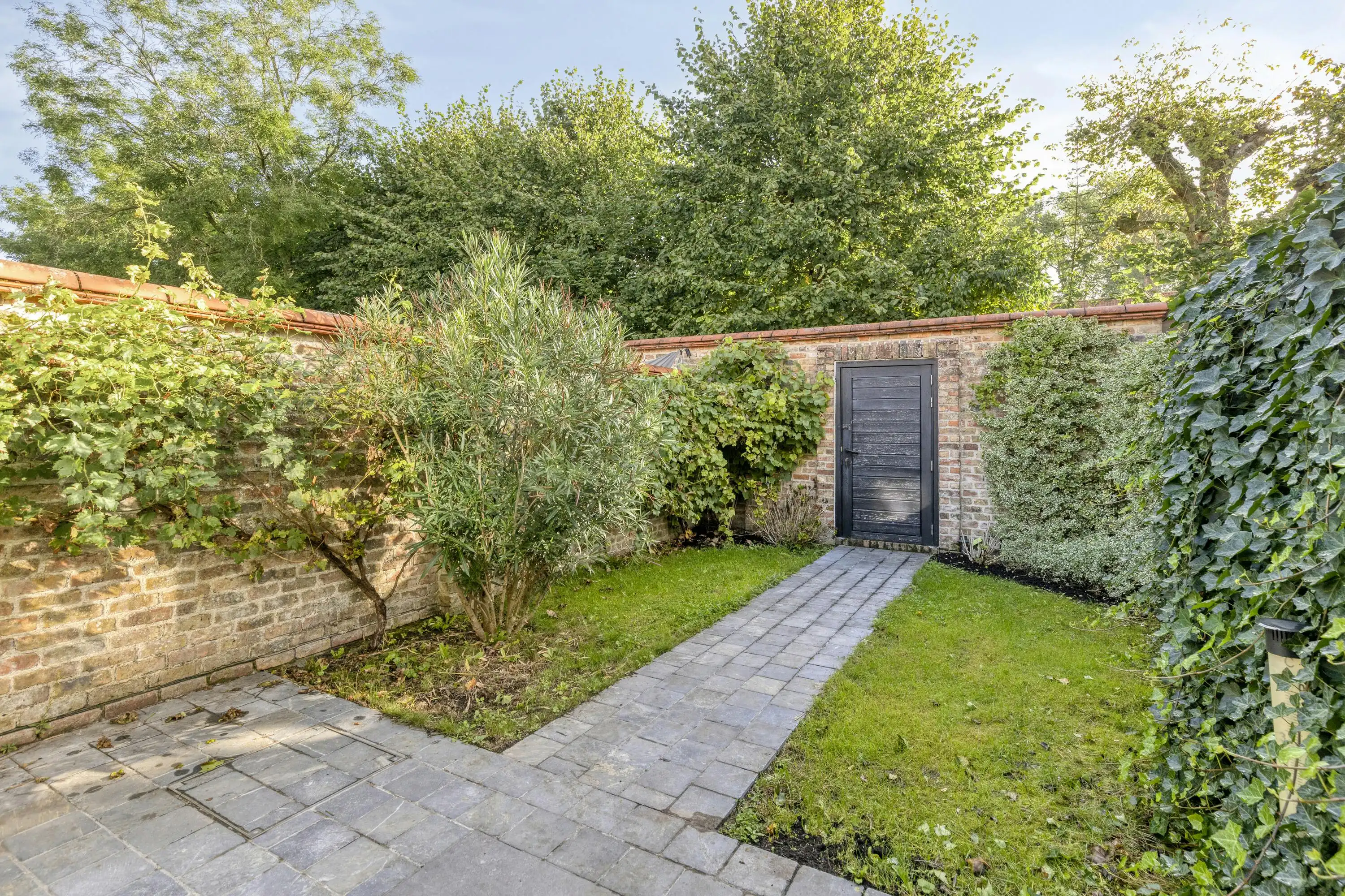 Instapklaar huis te koop met tuin en garage in Brugge foto 13