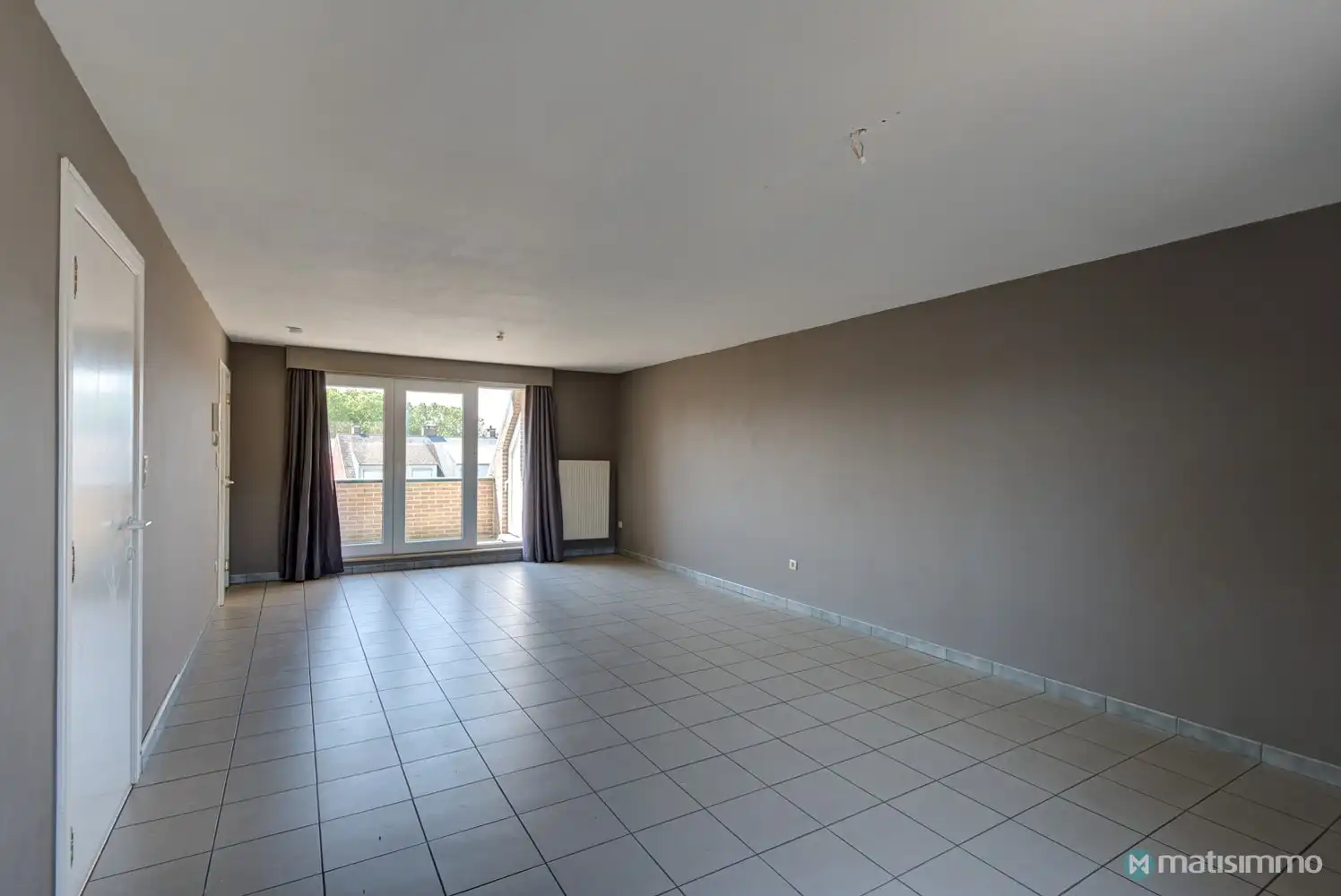 INSTAPKLAAR DUPLEX-APPARTEMENT MET 2 SLAAPKAMERS EN GARAGE NABIJ HET CENTRUM VAN BILZEN foto 2