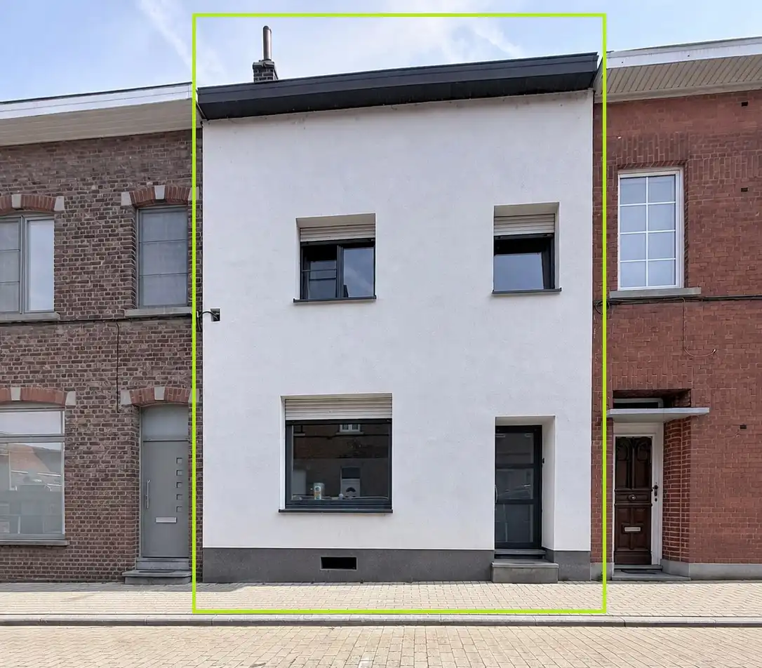 Karaktervolle stadswoning met prachtige tuin in het hart van Tienen foto {{pictureIndex}}