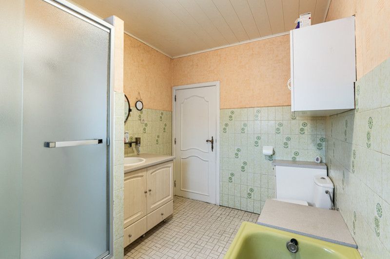 Gelijkvloerse woning met grote loods achteraan op 25are foto 30