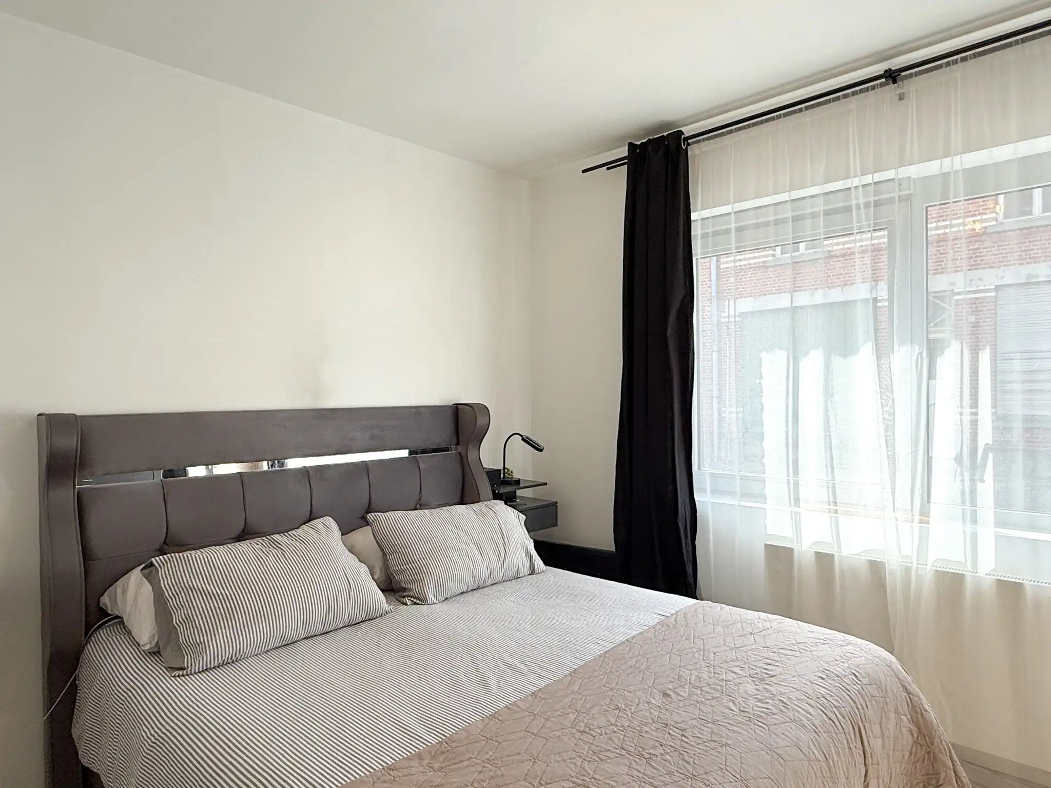 Gelijkvloers appartement met 2 slaapkamers en autostaanplaats foto 9