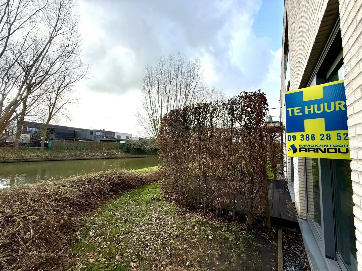 Centraal gelegen, gelijkvloers appartement met 2 slaapkamers en terras met zicht op de Leie foto 8