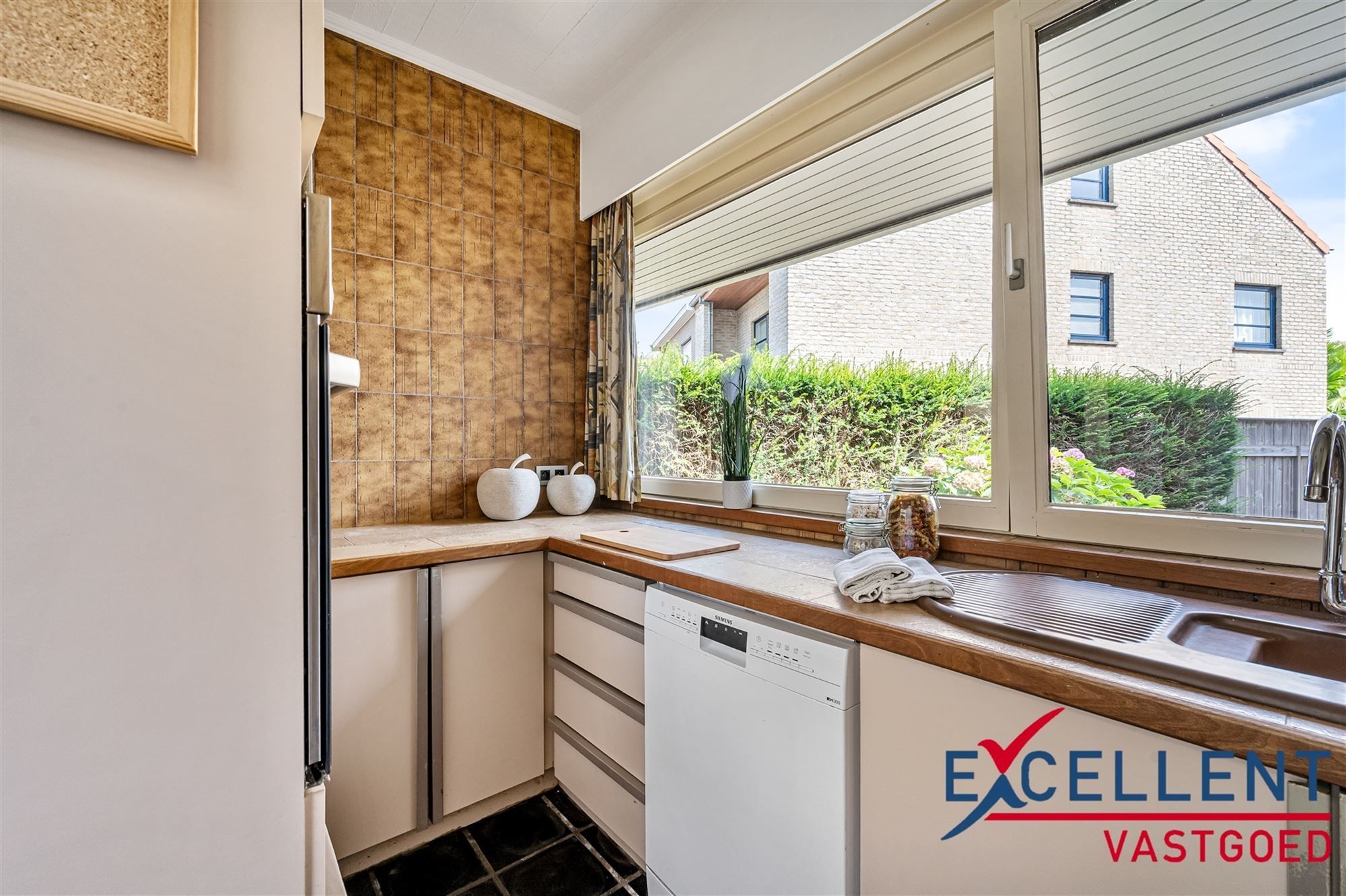 Charmante woning met prachtige tuin en bijhorend handelspand  foto 4