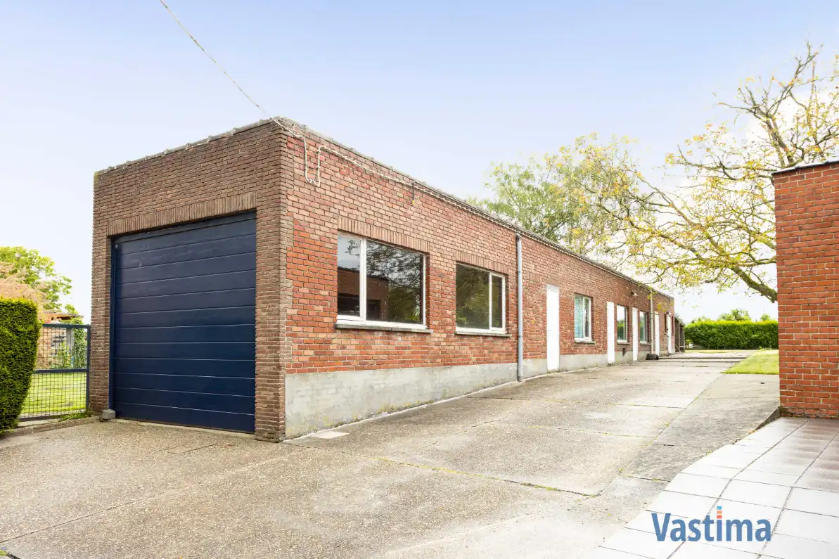 Woning met opslagruimte en grond op strategische ligging foto 21