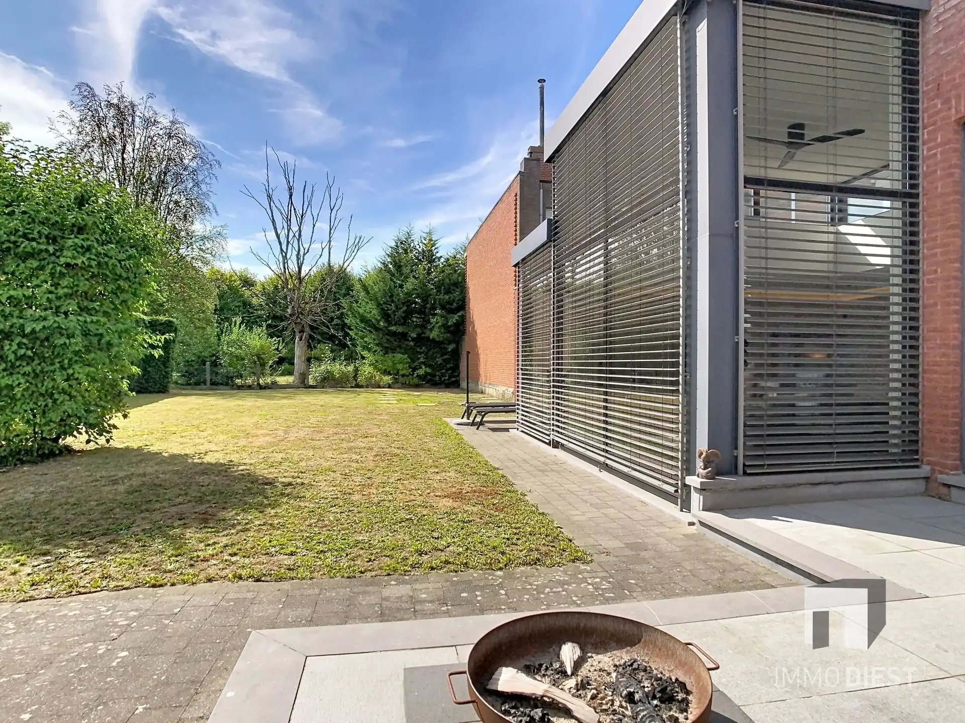 Moderne, lichtrijke woning met aangename tuin aan de voet van hartje Scherpenheuvel. foto 30