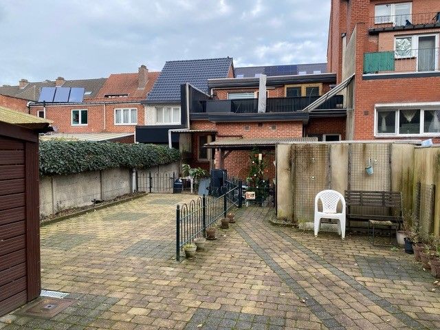 Genk, Nieuwe Kuilenweg 57 - Opbrengsteigendom bestaande uit 2 appartementen, 1 studio, 2 garages, 4 autostaanplaatsen en tuin. foto 7