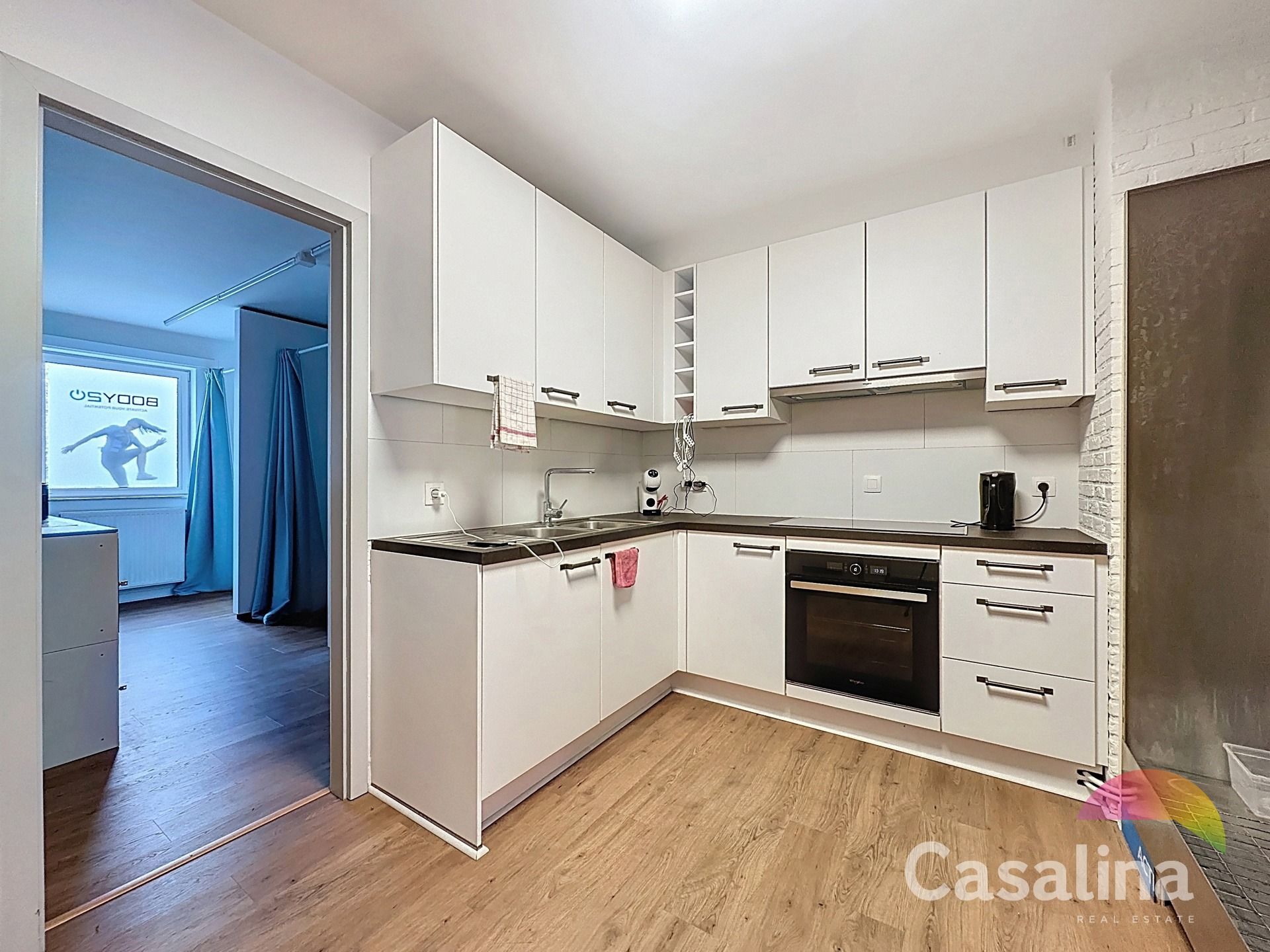 Gemengd gebouw bestaande uit 2 handelsruimtes en 4 woonunits foto 5