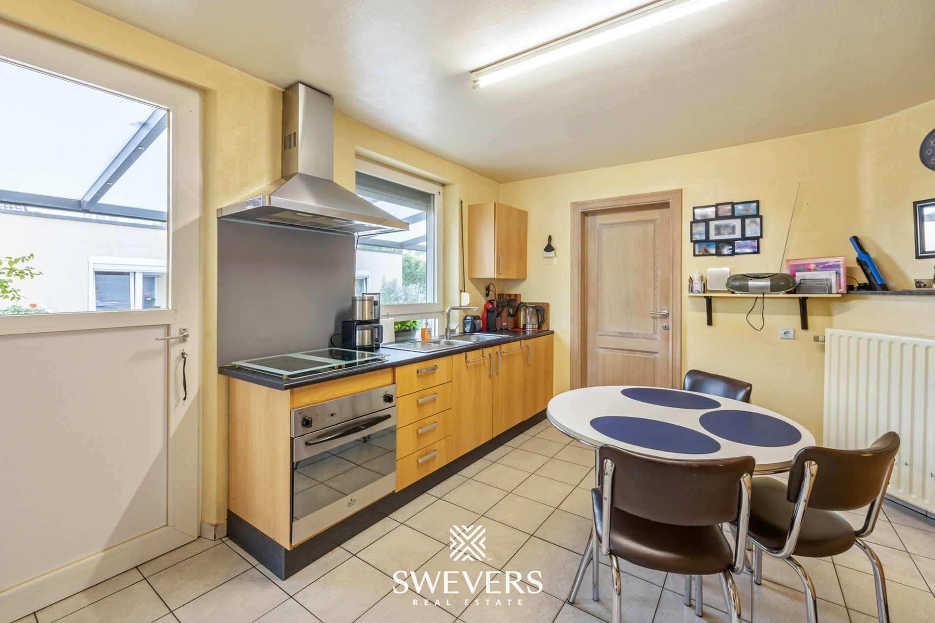 Instapklare gezinswoning met ruimte, tuin en rendement in Leopoldsburg foto 11