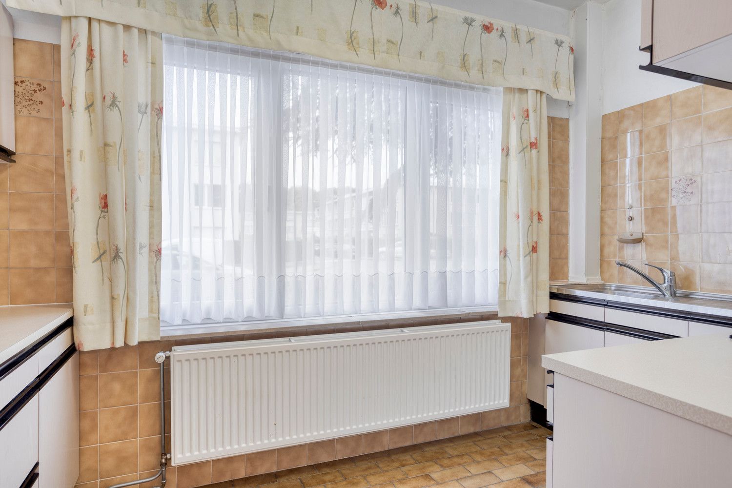 Te renoveren gelijkvloers appartement met 2 slaapkamers en tuin! foto 12