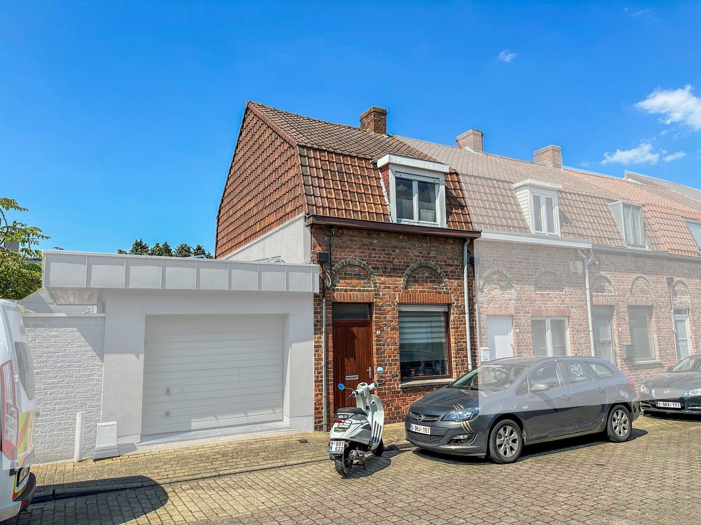 Gezellige en gunstig gelegen rijwoning met zonnige koer. foto {{pictureIndex}}