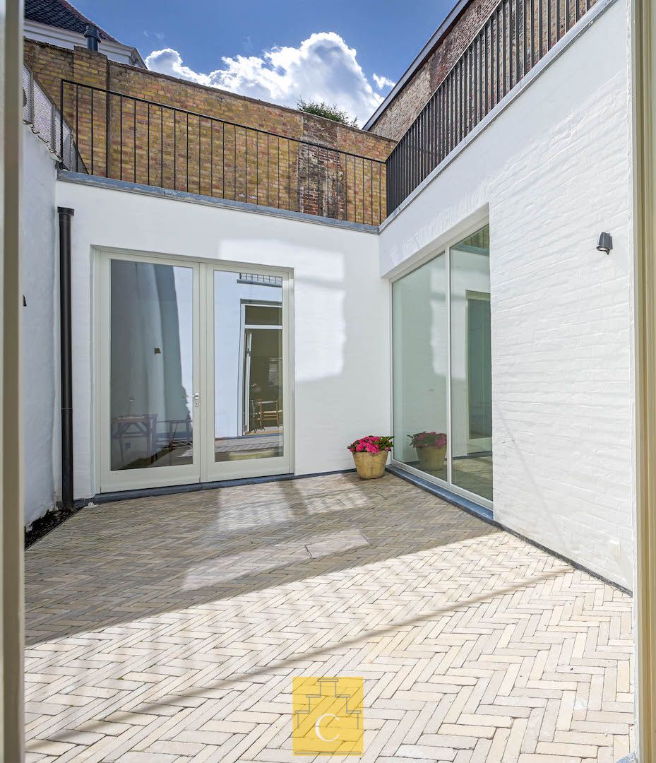 pas gerenoveerd diephuis op iconisch stadsplein, een meesterwerk van historiek en hedendaagse luxe foto 18