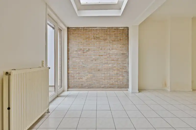 CHARMANTE WONING MET ZONNEPANELEN EN ZUIGERICHTE TUIN foto 8