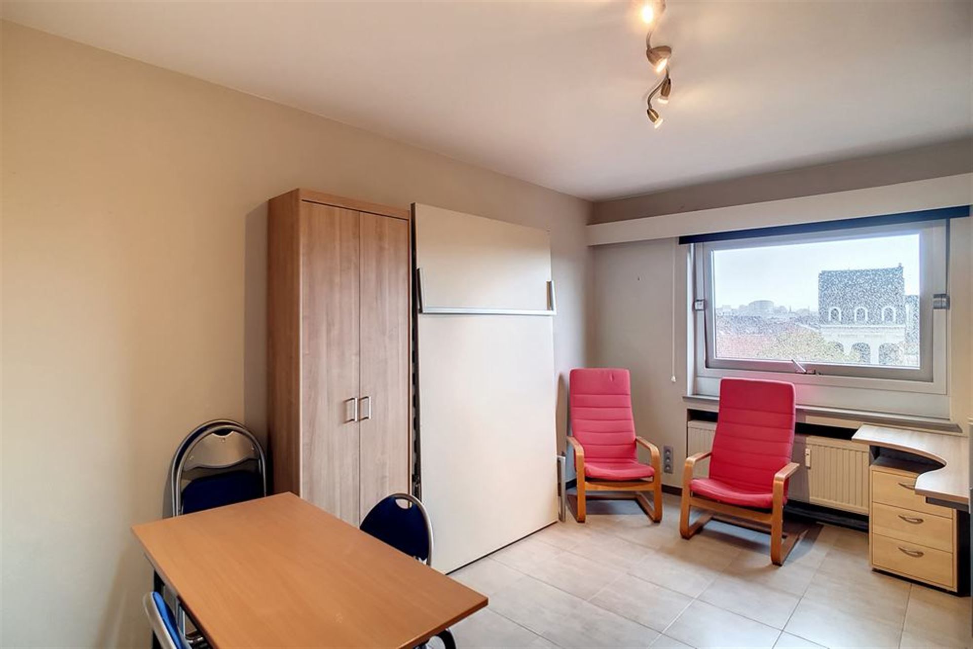 Gemeubelde Studio nabij Centrum Leuven foto {{pictureIndex}}