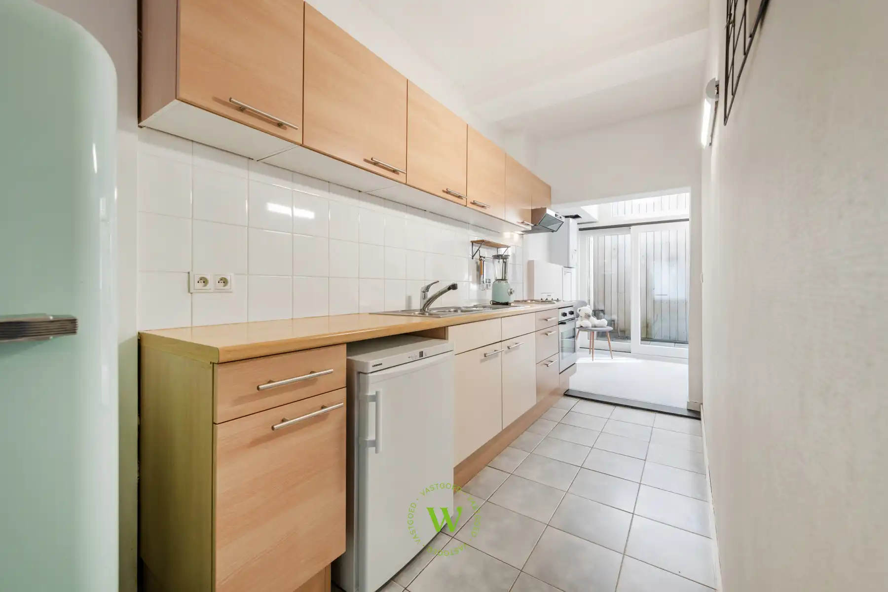 Lichtrijk gelijkvloers appartement met private inkom foto 11