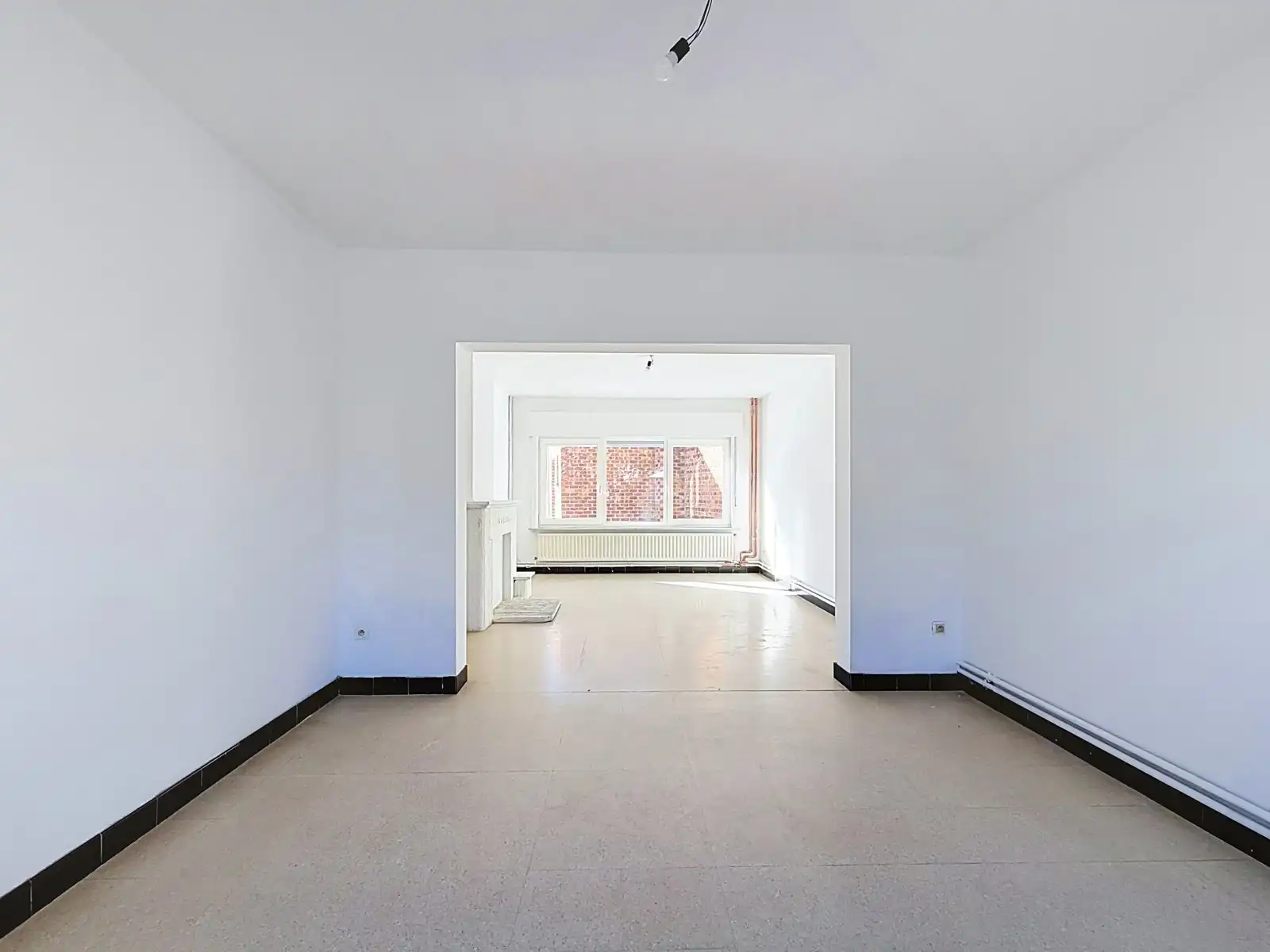 Gezinswoning met 2 SLPK, Tuin én Garage! foto 4
