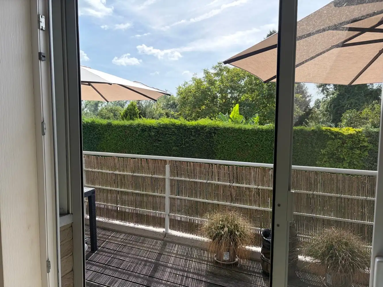 Duplex appartement met ruim terras en carport/berging foto 8